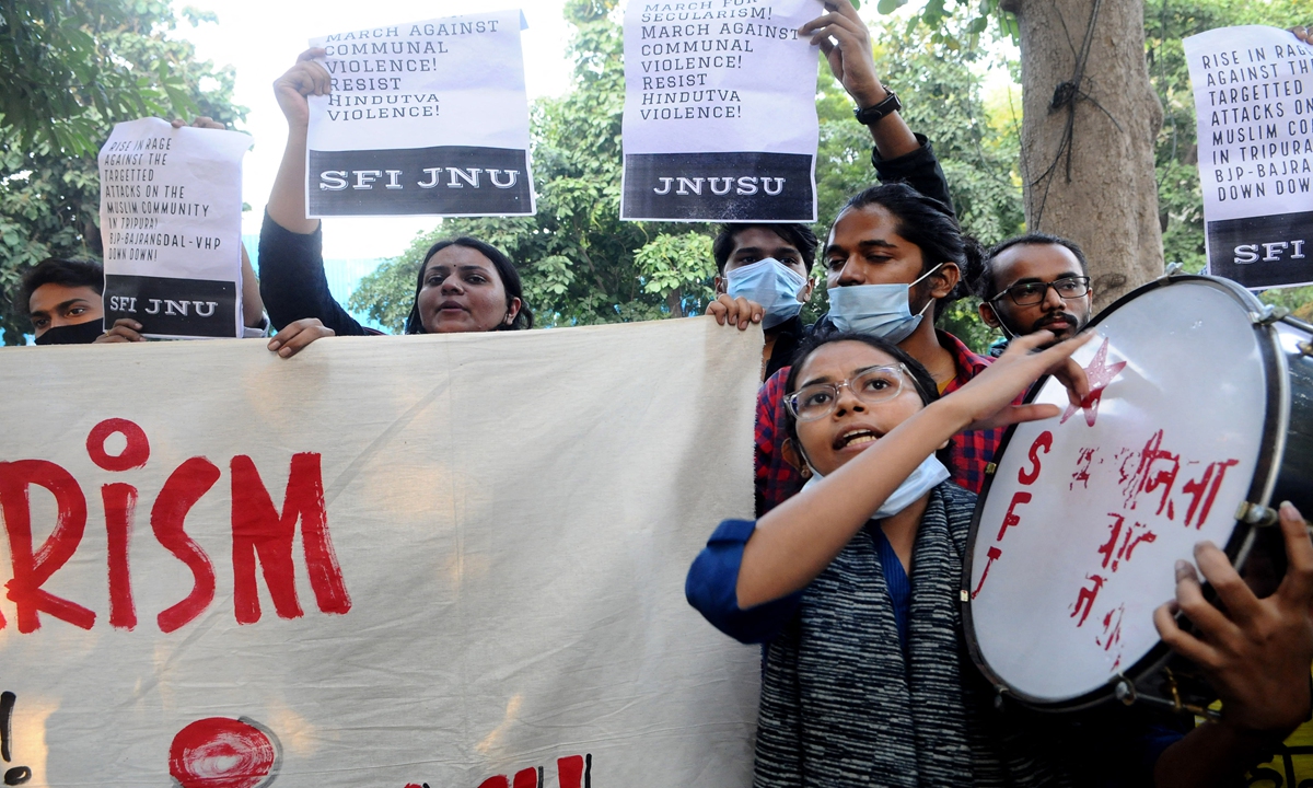 NEW DELHI, INDIA - NOVEMBER 01: Indian student wing of Jawaharlal Nehru University (JNU) shout slogans during the protest against recent incidents of anti-Muslim violence in India's north-eastern state of Tripura on November. 01, 2021 in New Delhi, India. Imtiyaz Khan / Anadolu Agency
Imtiyaz Khan / ANADOLU AGENCY / Anadolu Agency via AFP